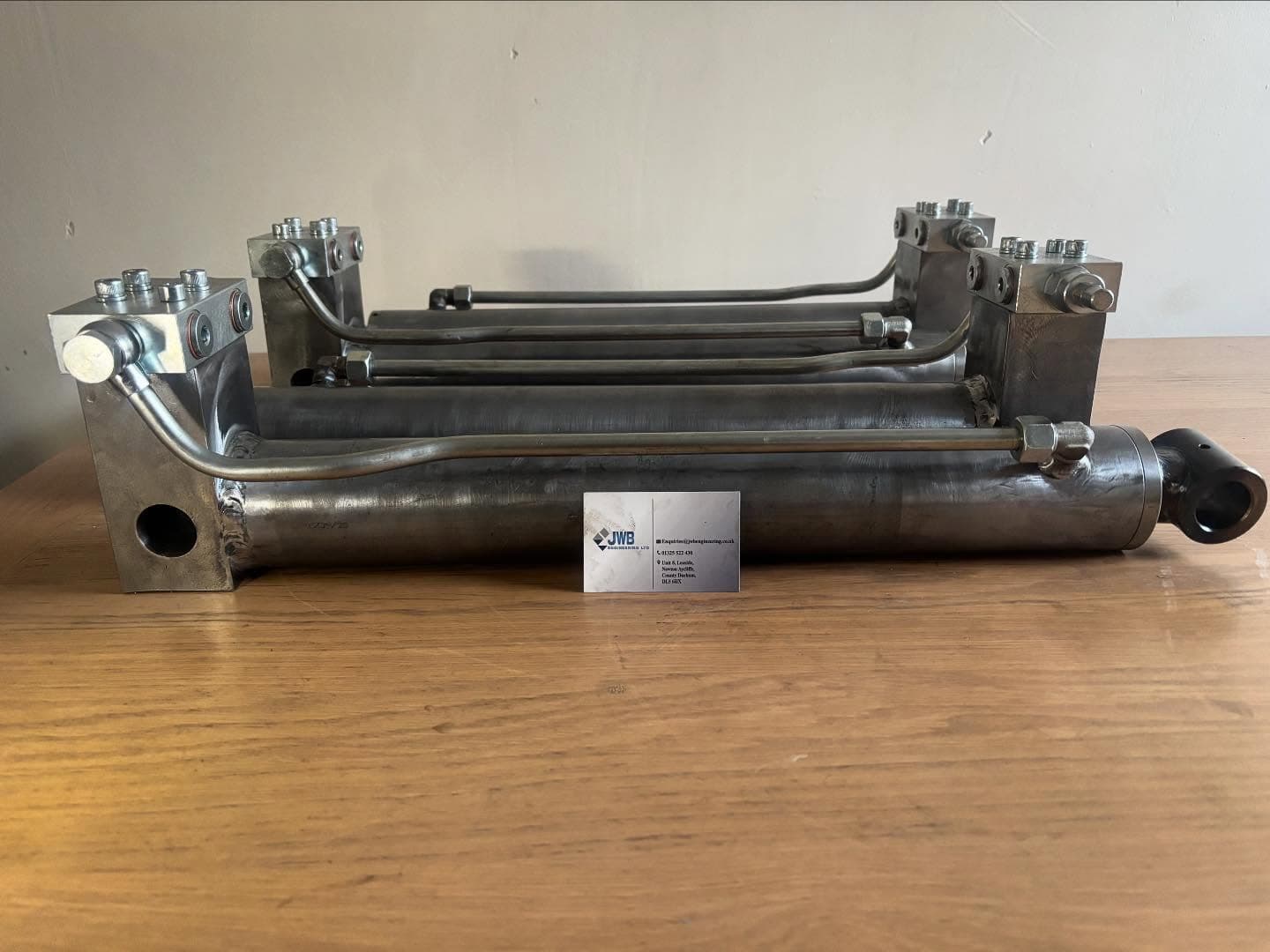 Bespoke hydraulic cylinder with welded manifold blocks and formed pipework, built at the JWB Engineering workshop in Newton Aycliffe